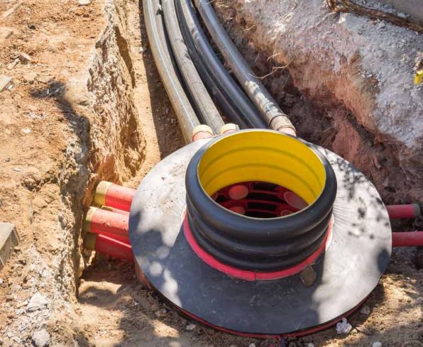 Cables and optical fibres in the digging on a construction site — Leak Detection in Burleigh Heads, QLD