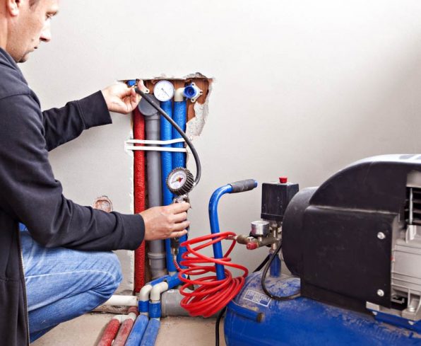 Plumber testing compressor leaks — Smart Water Metering in Burleigh Heads, QLD