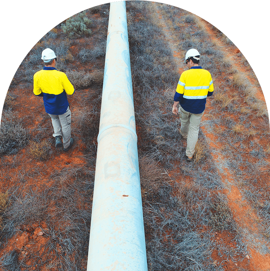 Two Workers checking the pipe onsite — Commitment to HSQE in Burleigh Heads, QLD