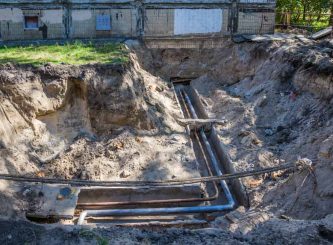 Excavated water pipes after replacement near the old house — Water Management Near Me in WA