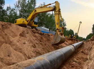 Excavator and pipe layer — Water Management in Burleigh Heads, QLD